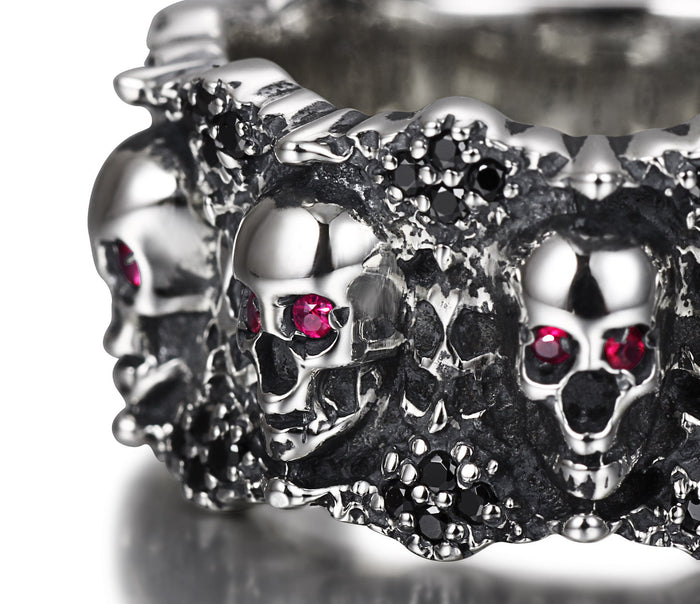 Eyes of Five Elements - Sterling Silver Carved Skulls Ring with Ruby Eyes